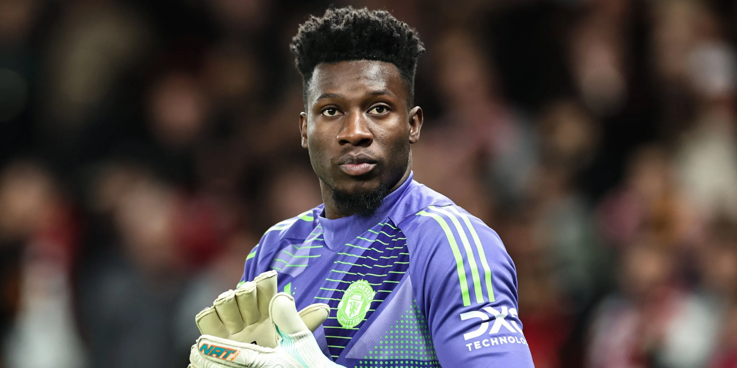 Andre Onana trong một trận đấu cho Manchester United, bàn về giá trị chuyển nhượng.